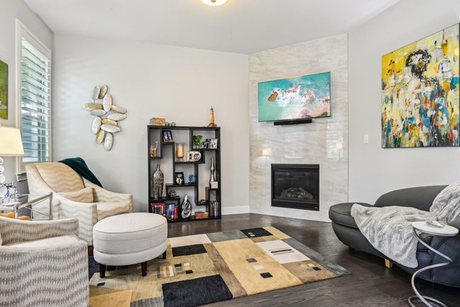 Sitting room in primary suite with fireplace | Image 17
