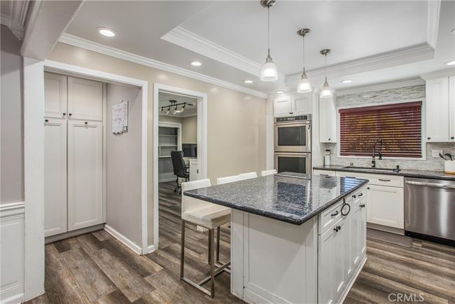 A better view of the office and now a view of the pantry. | Image 13