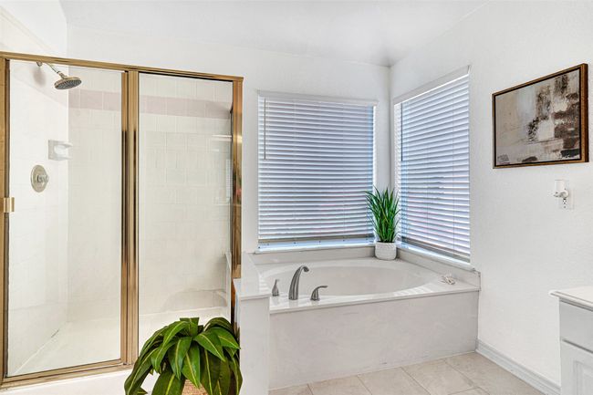 garden tub and separate shower in primary bathroom | Image 23