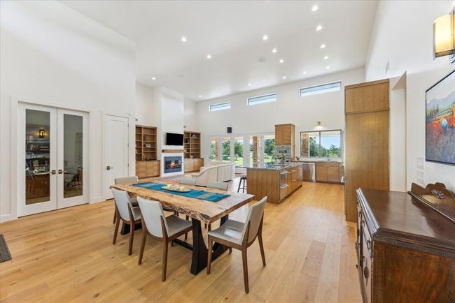 Alternate view of Dining and French Doors leading into Study. | Image 16