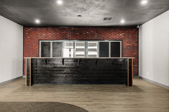 Detailed view of wood finished floors, recessed lighting | Image 45