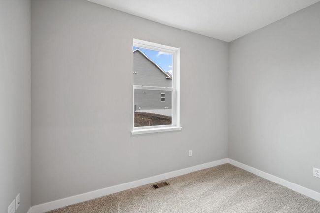 Main floor flex room perfect for working from home, hobbies, or a toy room. Model home. Options and colors will vary. | Image 18
