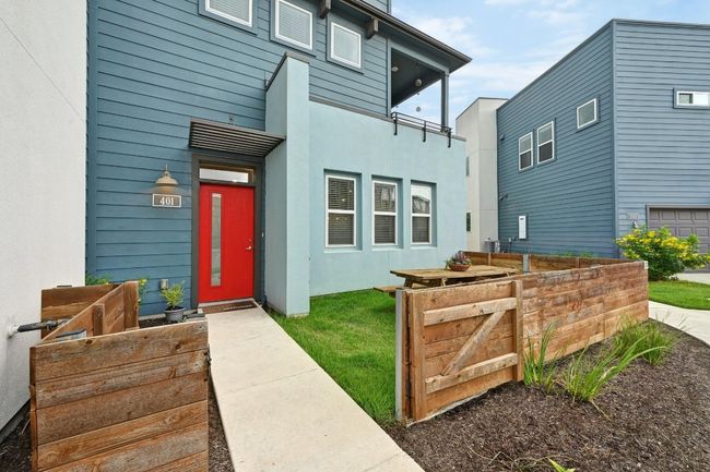 Enjoy a well-kept, beautifully landscaped front yard with minimal upkeep; let the HOA handle the details while you enjoy the space | Image 4