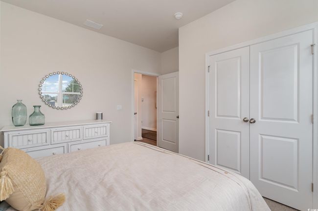 Bedroom with a closet | Image 20