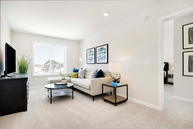 Second floor loft located off entrance to three upper level bedrooms. | Image 15