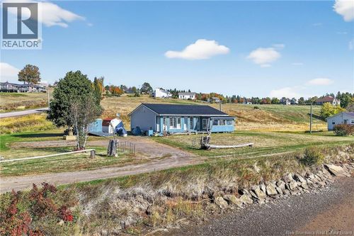 1411 Rte 515, Bouctouche Cove, NB, E4S4J5 | Card Image