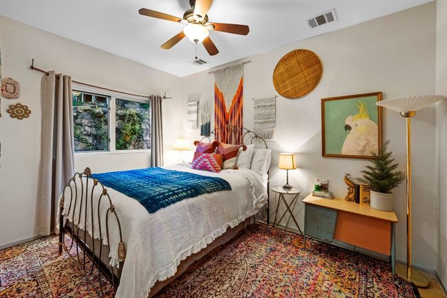 Guest suite with slate floors under rug! | Image 31