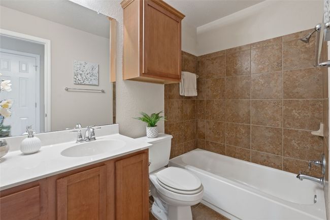 Full bathroom with vanity and shower combination | Image 34
