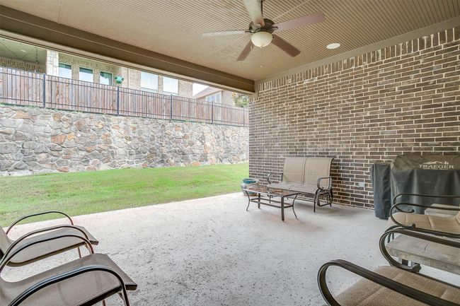 View of patio / terrace featuring ceiling fan | Image 40