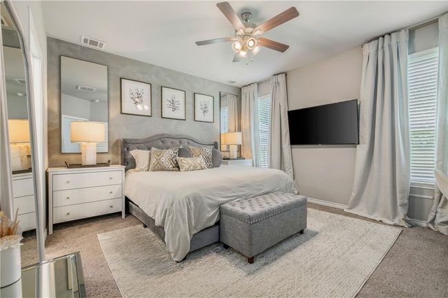 Bedroom with carpet flooring and ceiling fan | Image 22