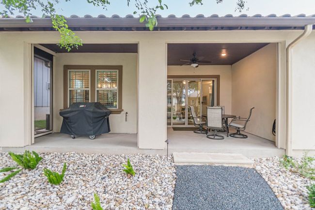 View of patio / terrace with area for grilling and a ceiling fan | Image 32