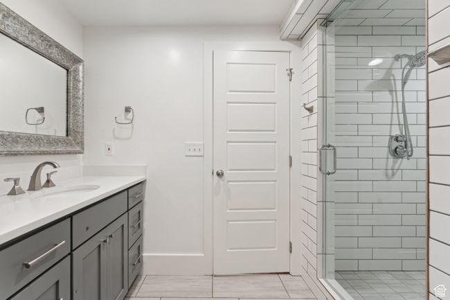 Full bath featuring vanity and a shower stall | Image 28