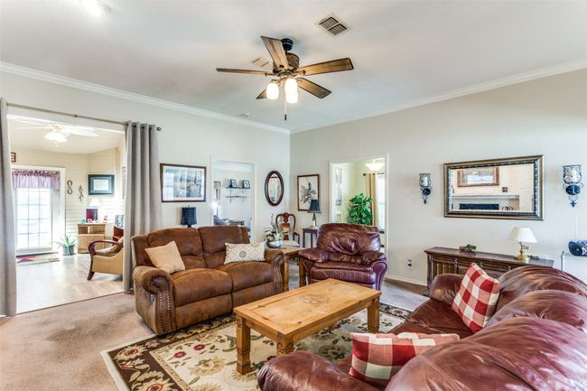 looking from living room into sunroom | Image 7
