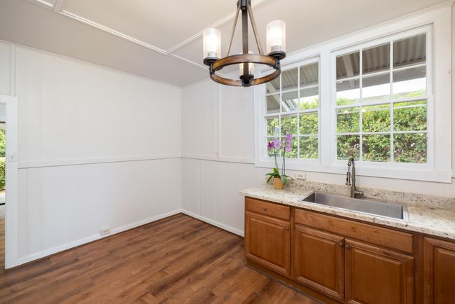 Dining table space in kitchen. Nice large stainless sink. | Image 5