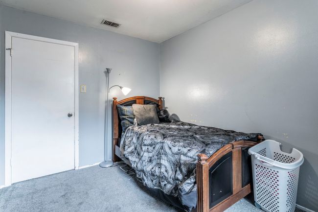 Bedroom featuring carpet flooring | Image 18