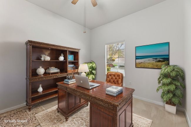 Office with ceiling fan, light colored carpet, and vaulted ceiling | Image 7
