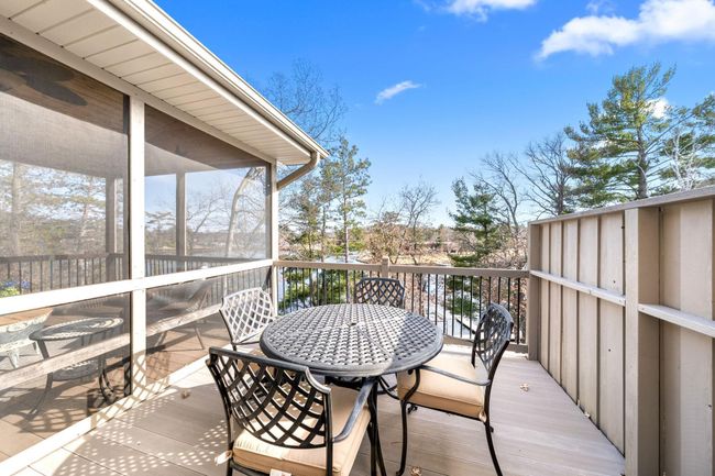Adjacent deck offers pure sunshine and relaxation! Porch and deck have maintenance free decking. | Image 12