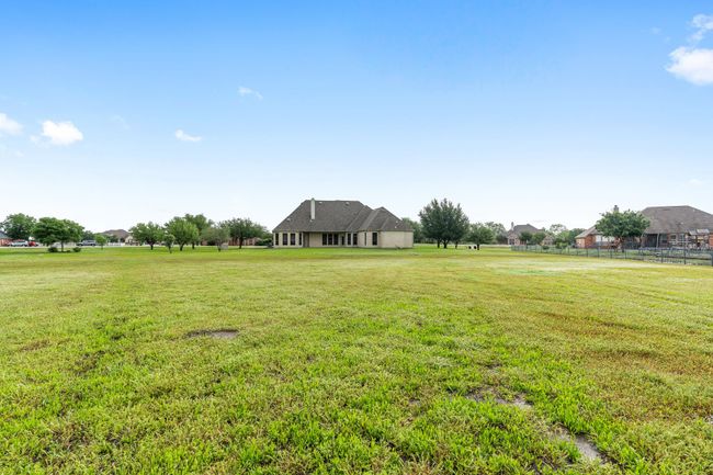 View from the back fence towards the back of the house. So much space for whatever you desire! | Image 33