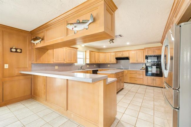 247 Schooner Dr, House other with 3 bedrooms, 2 bathrooms and 5 parking in Freeport TX | Image 15