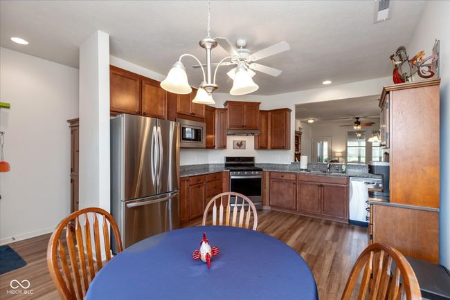 kitchen with breakfast nook area | Image 10