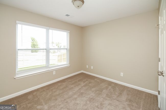 7144 Caspian Dr, House other with 7 bedrooms, 3 bathrooms and null parking in Fairburn GA | Image 15