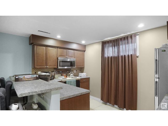 12815 79 St Nw, House other with 5 bedrooms, 2 bathrooms and 2 parking in Edmonton AB | Image 28