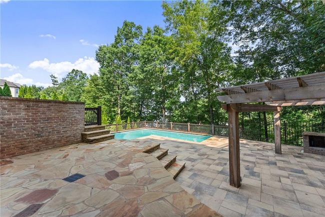 5610 Point West Dr, House other with 6 bedrooms, 7 bathrooms and null parking in Oakwood GA | Image 55