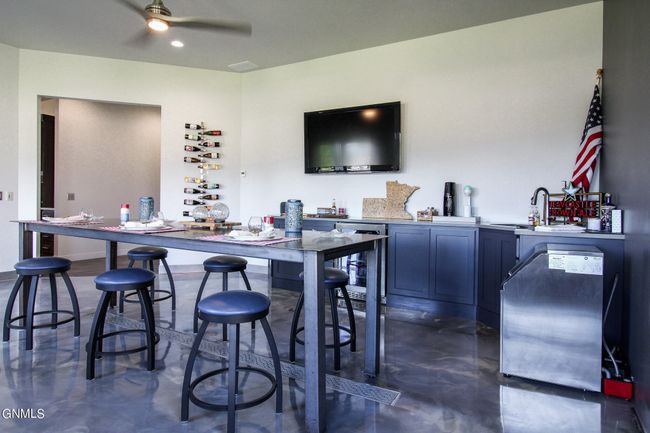 River Room with Custom 8' Rolled Steel Table and Floor Drain, Ice Maker & Beverage Fridge | Image 81