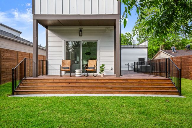 Wooden terrace with fence and a yard | Image 14