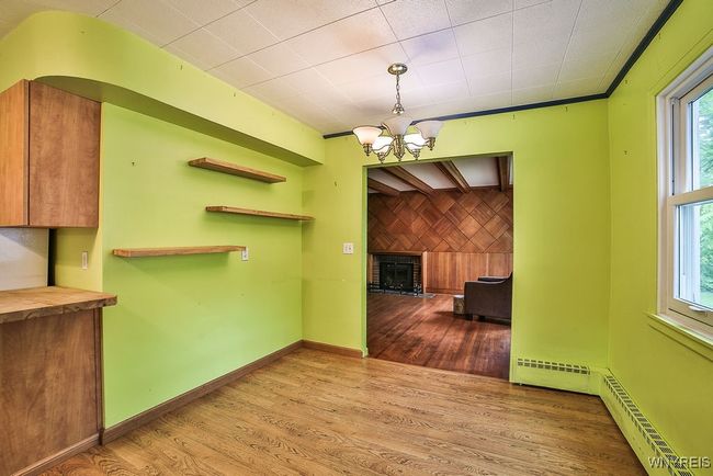 Dining area into living room view | Image 14