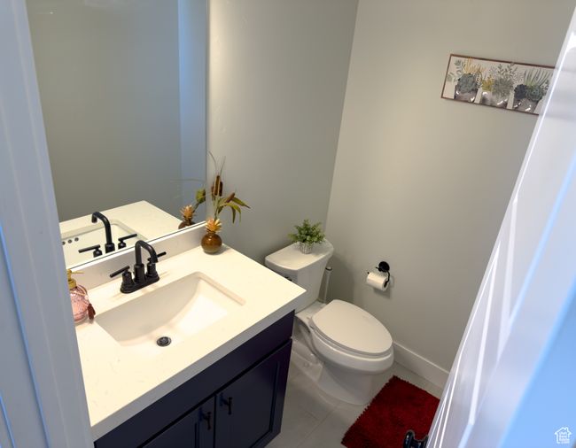 Bathroom featuring vanity and tile patterned floors | Image 18