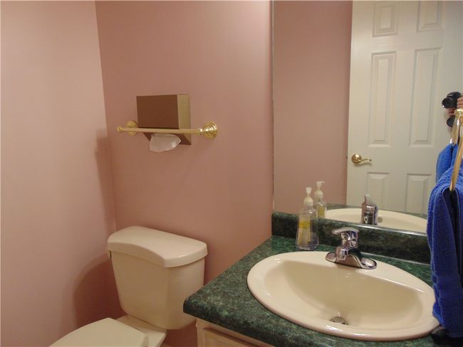 Half bath in hallway | Image 22