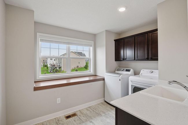 Spacious upper level laundry room | Image 33