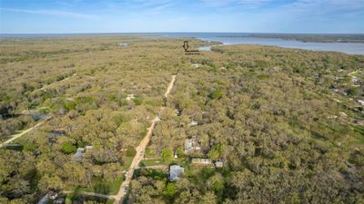 Black arrow indicates approximate location of lot. View is facing South. FM 751 is to the left. | Image 1