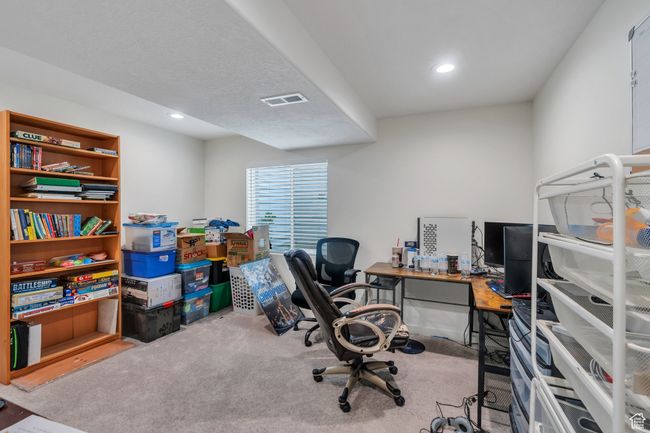 Home office with carpet floors and recessed lighting | Image 17