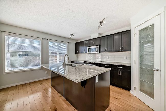 212 Autumn Green Se, House other with 3 bedrooms, 3 bathrooms and 2 parking in Calgary AB | Image 4