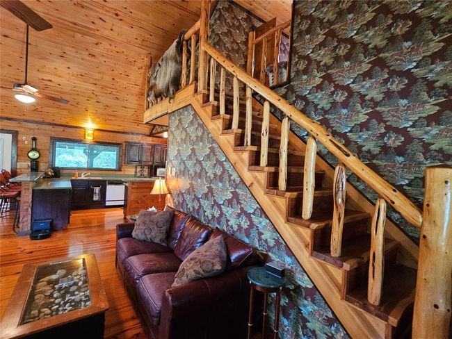 A Closer Look at the Rustic Wooden Staircase! | Image 16