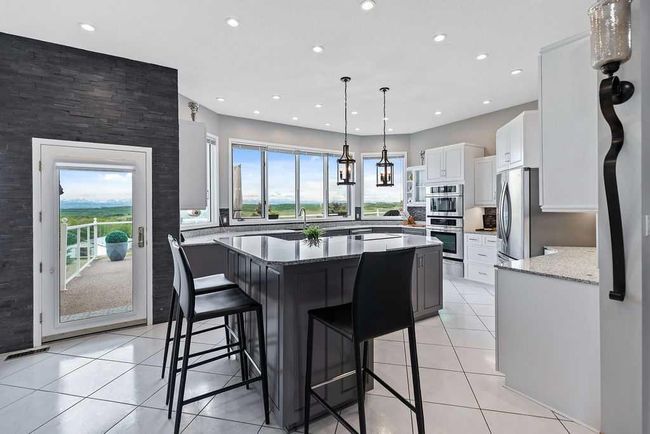 112067 292 Ave W, House other with 5 bedrooms, 6 bathrooms and 6 parking in Foothills AB | Image 18