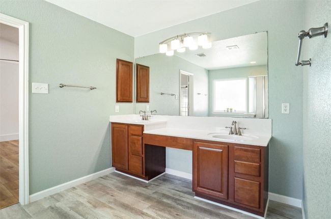 Double sink vanity with two levels for buyers of all heights | Image 21
