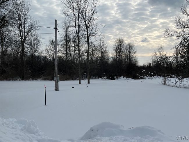 Back of property with well, septic and pad from previous home. | Image 5
