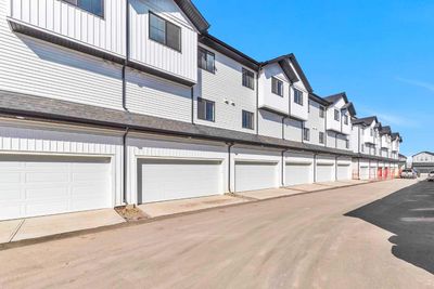 102 - 340 Ambleton St Nw, Home with 4 bedrooms, 2 bathrooms and 3 parking in Calgary AB | Image 3