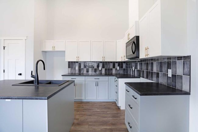 125 Upland Blvd, House other with 5 bedrooms, 3 bathrooms and 2 parking in Brooks AB | Image 7