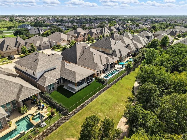 Aerial perspective of suburban area featuring a pool area | Image 36
