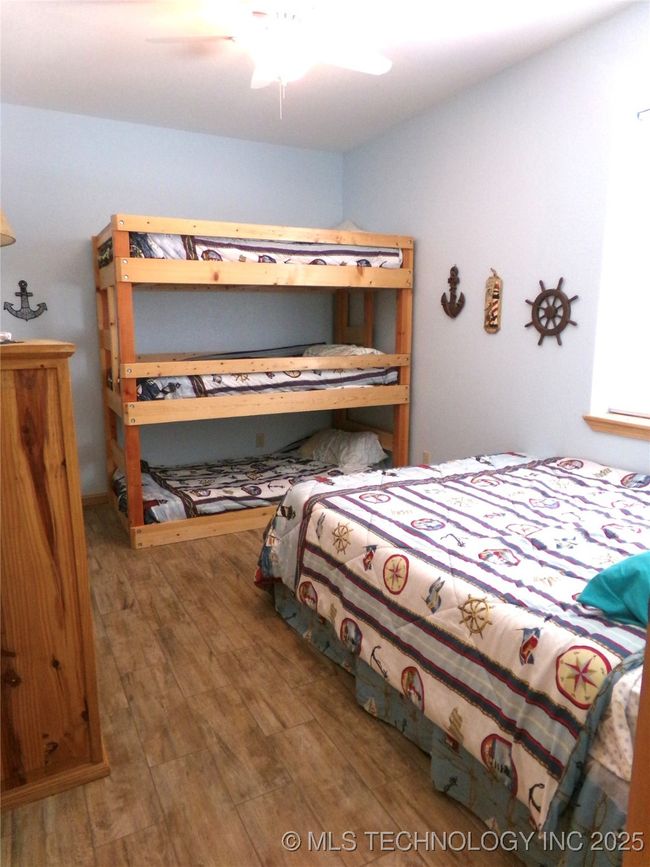 Bedroom 2 with twin bunk beds and full bed | Image 18