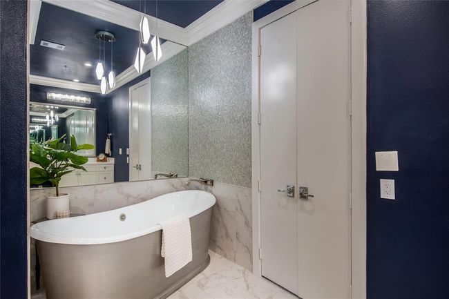Can you see yourself relaxing after a long day in the 68" soaking tub before enjoying the view from the patio! | Image 21