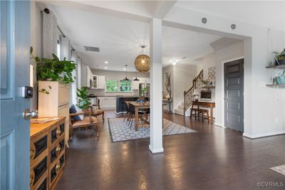 Open floor plan, dark hardwood flooring, view from front door. | Image 2