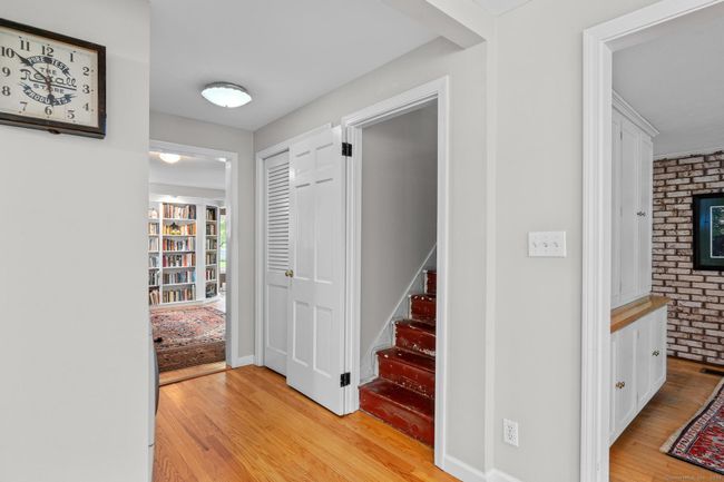 As you leave the kitchen, go straight into the dining room or turn right to find the first staircase to go upstairs or straight to find more living space! | Image 16