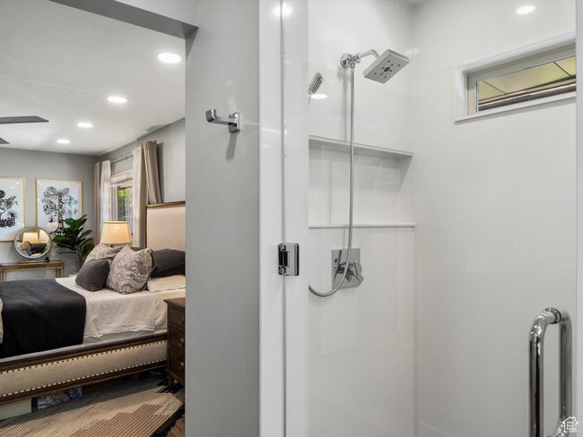 Ensuite bathroom featuring recessed lighting, a shower, and ceiling fan | Image 22