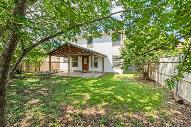 Rear view of house featuring a patio and stucco siding | Image 40