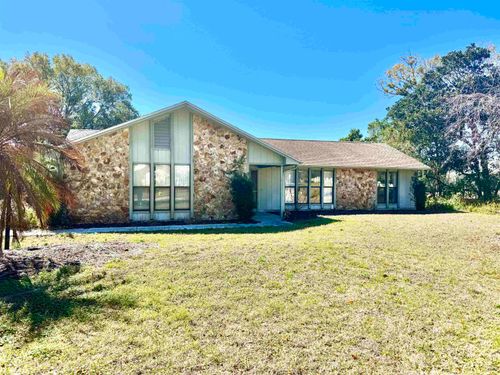 1074 Club House Blvd, New Smyrna Beach, FL, 32168-7964 | Card Image